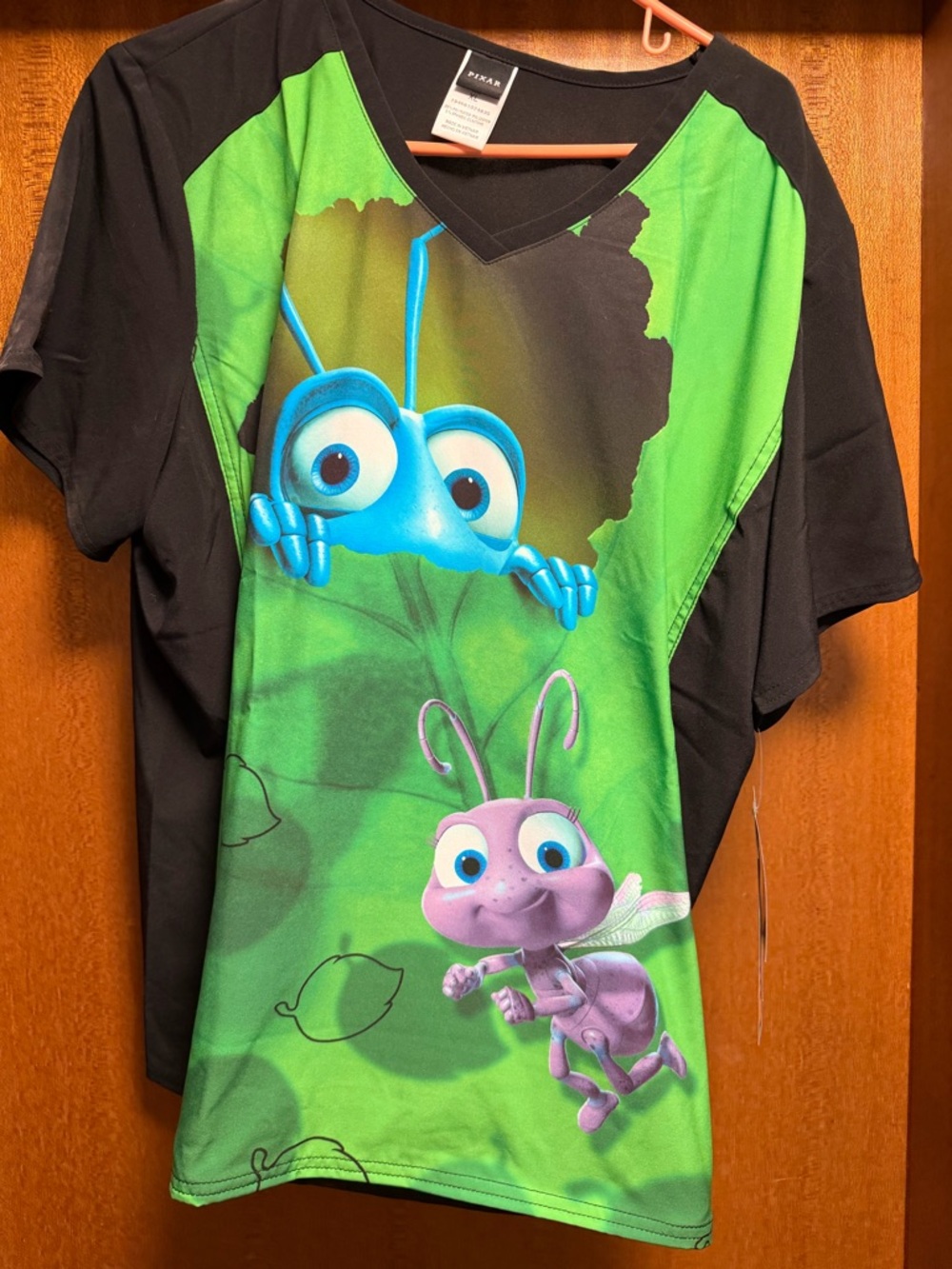 Disney Black & Green Animated Ant V-Neck scrub top